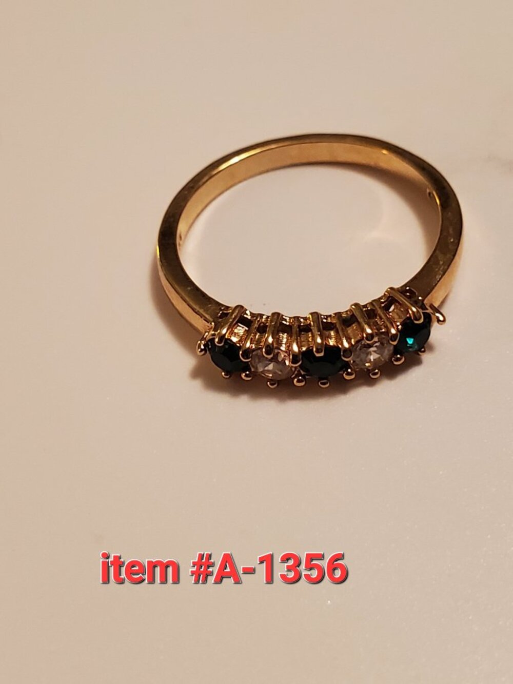 1 Gold Ring with Green & White gem stones, item # A-1356, wt. 2 grams, size 8.2
